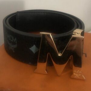 MCM men’s belt, Black Belt With Gold MCM buckle, 28-36 Waist; AUTHENTIC GRT COND